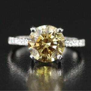 Platinum 5.29 CTW Fancy Yellow Diamond Ring with IGI Report